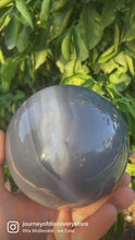 Load and play video in Gallery viewer, Blue Agate Sphere with Quartz Crystal Inclusions - Polished
