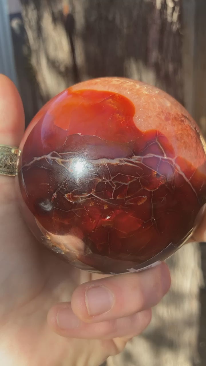 Carnelian Sphere with Quartz Crystal Inclusions - Polished